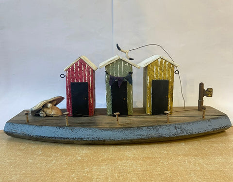 Beach Hut Scene - by Emma Frame